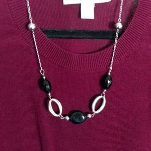 Silvertone necklace with black acrylic beads